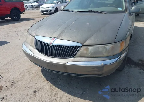 2000 Lincoln Continental z USA, uszkodzony, nr VIN 1LNHM97V0YY840446